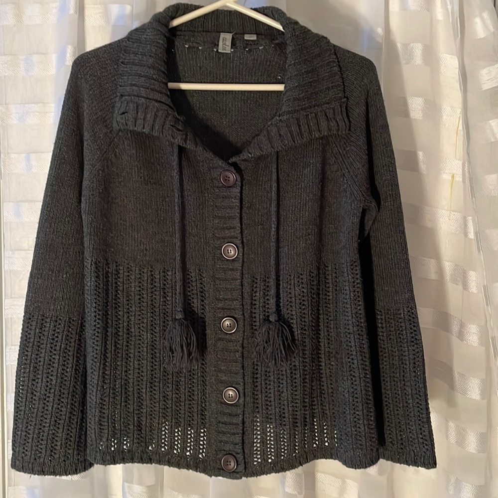Grey sweater jacket.